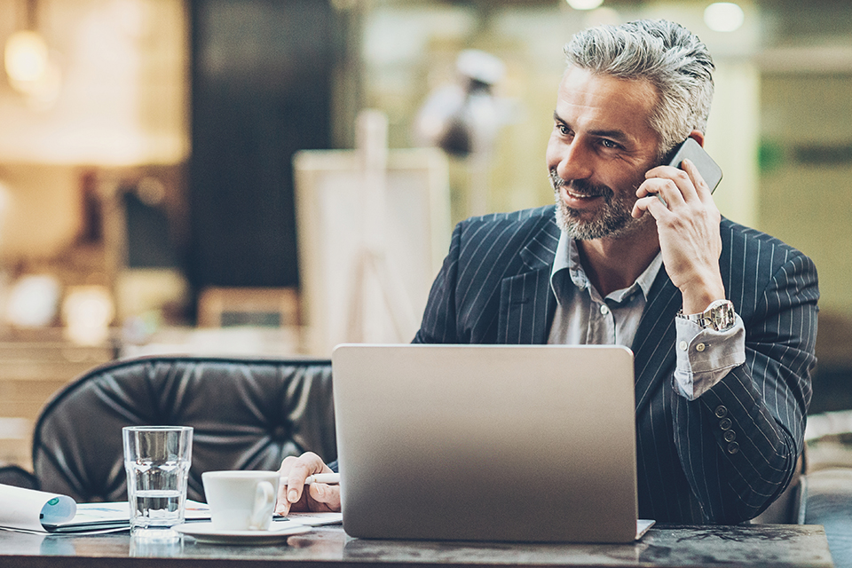 CFO on a call with his team about how to prioritize energy efficiency