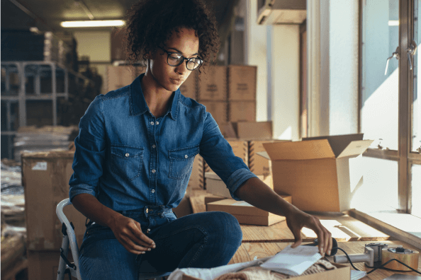 woman wrapping packages