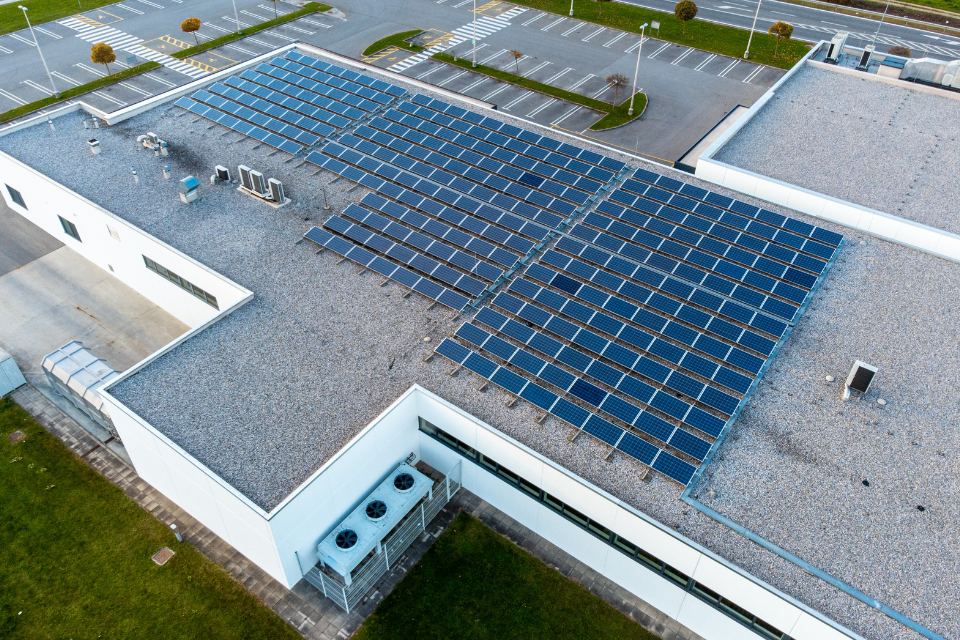 Solar panels installed on a office building rooftop