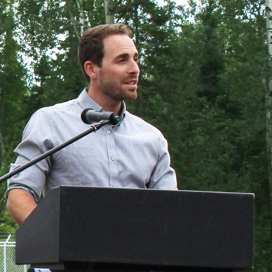 Nik Schruder speaking at an event