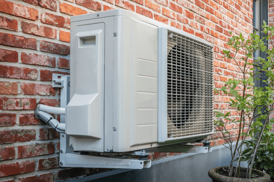 heat pump install on the side of a house