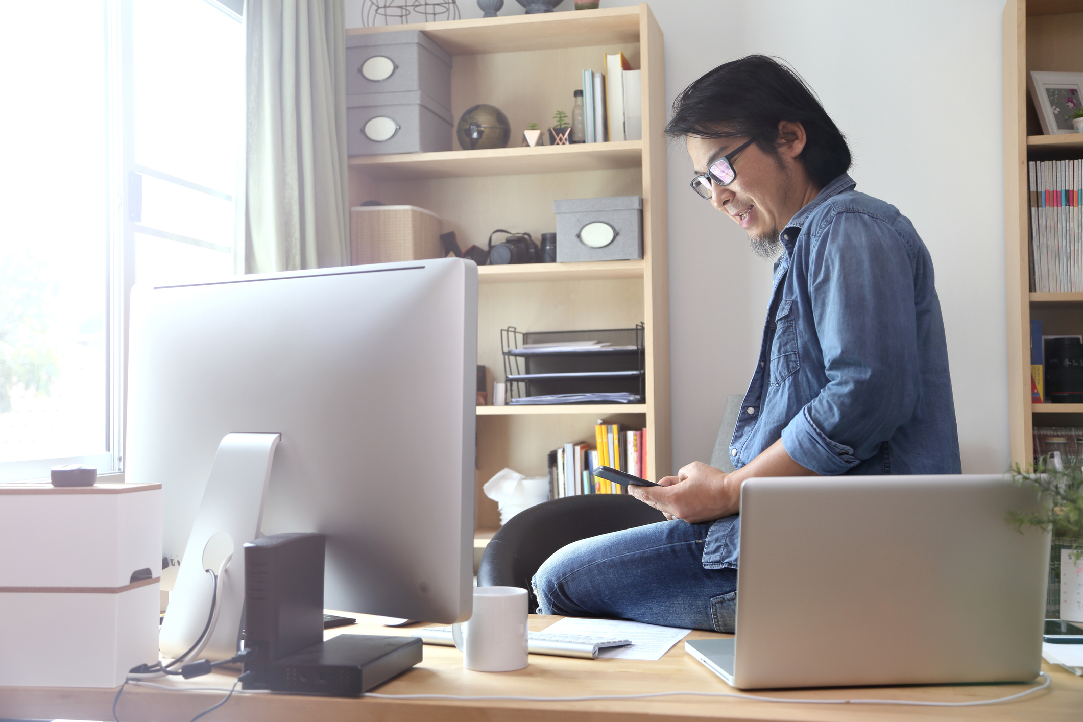 A man in his home office