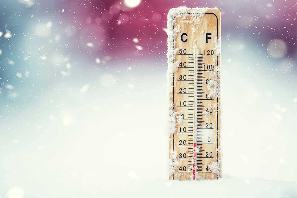 a thermometer in the snow shows the importance of bringing potential customers in from the cold